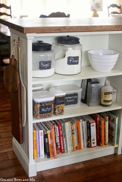 Kitchen island hacked with IKEA BILLY bookshelf, with storage for pantry items