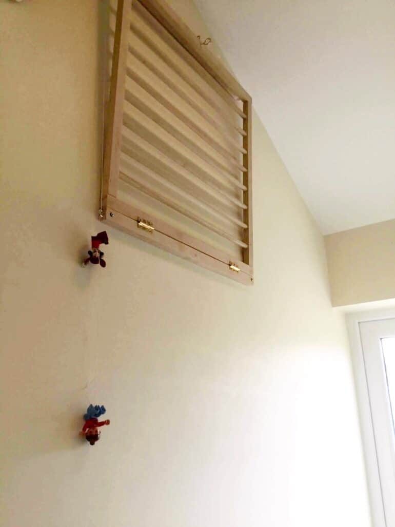 DIY retractable drying rack from an old IKEA crib