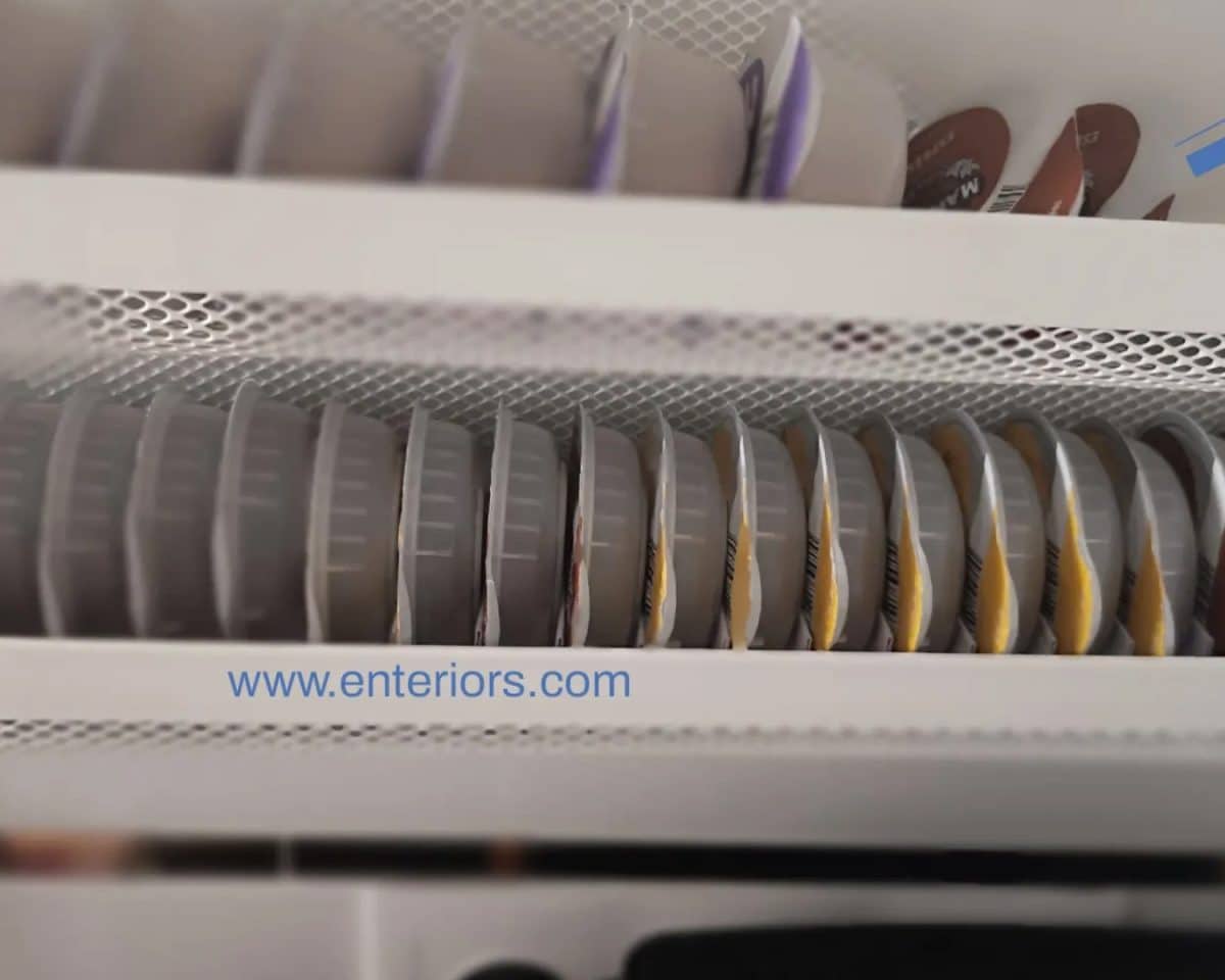 19 - IKEA Hackers Tassimo coffee pod storage organizer installed at the back of kitchen cabinet