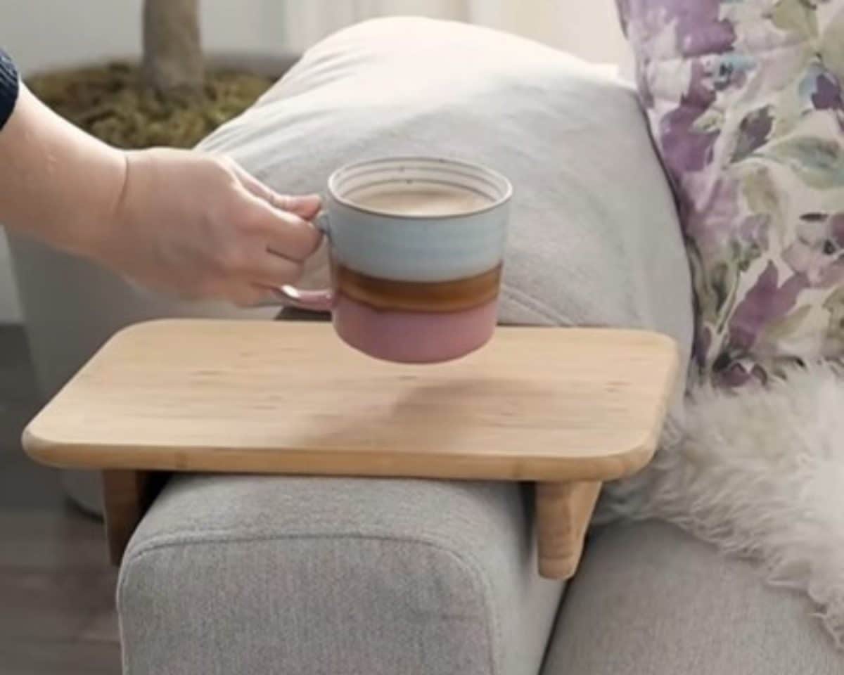 STOLTHET cutting board as sofa arm table