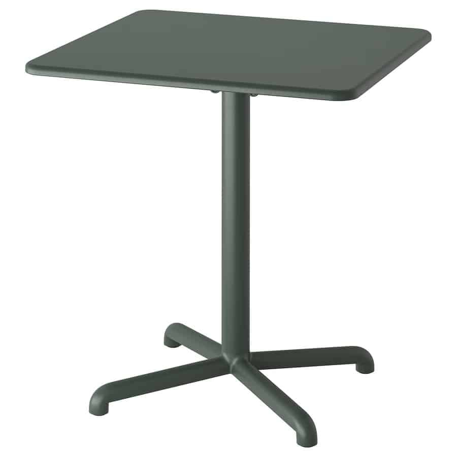 Green rectangular desk/tabletop on a single central column with a four‑leg pedestal base.