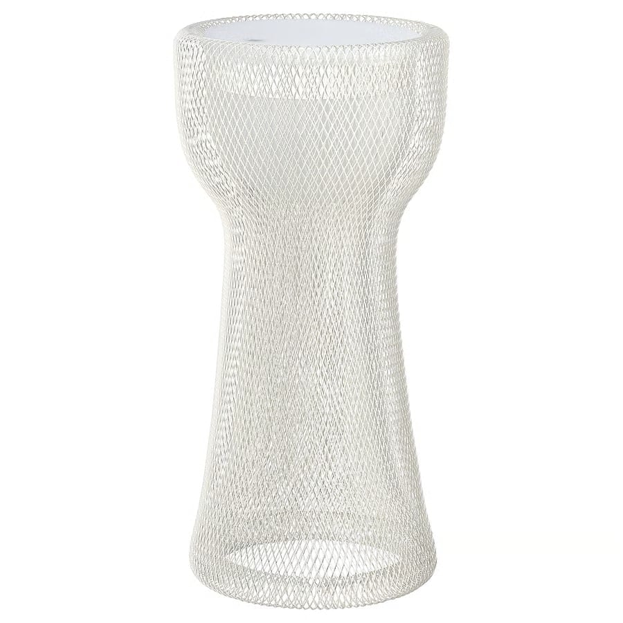 Hourglass-shaped metal wire mesh side table with a white circular top at the center of the image