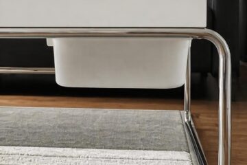 trofast bin affixed under table as a drawer