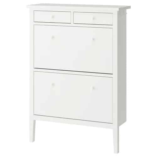 12 - IKEA Hackers White wooden dresser with two small top drawers and two larger lower drawers on short legs.