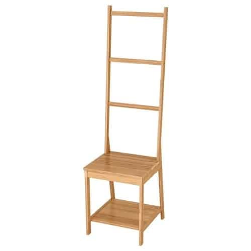 16 - IKEA Hackers Wooden ladder-style shelving unit with a square seat and two shelves above and below, supported by four legs.