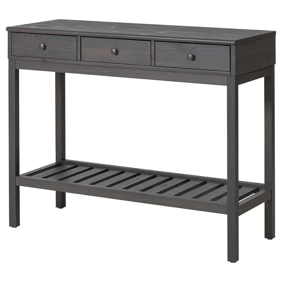 17 - IKEA Hackers Dark gray wooden console table with three small drawers on top and a lower slatted shelf.