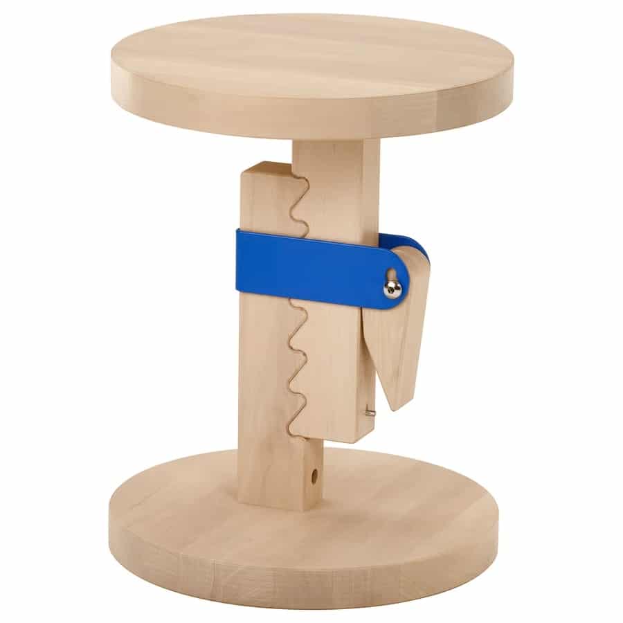 Round wooden table with a blue adjustable clamp attached to the central post.