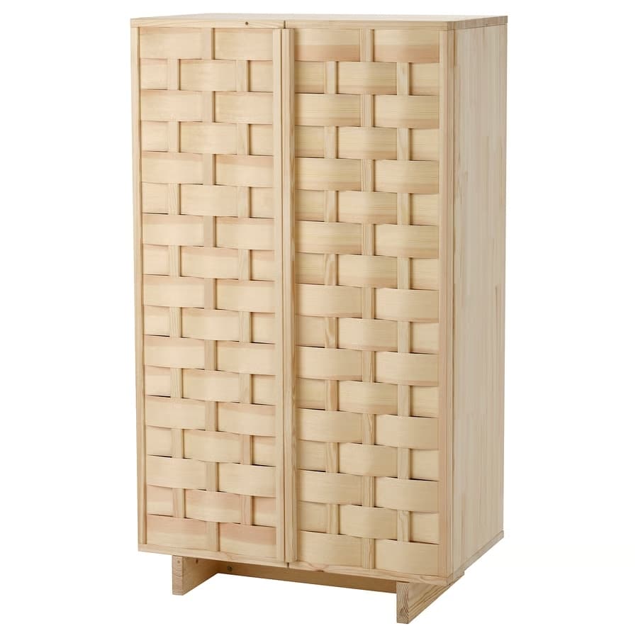 Tall wooden storage cabinet with basket-weave panel doors on a short base for closet use.