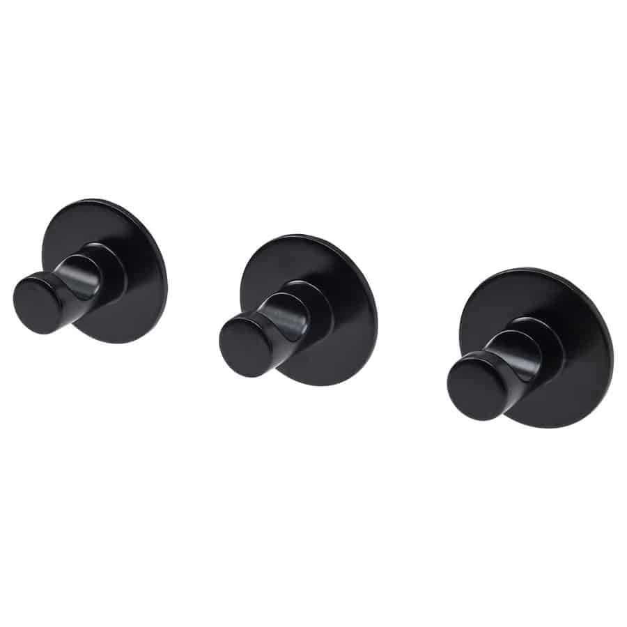 4 - IKEA Hackers Three black round cabinet knobs with circular backplates arranged in a row on a white background.