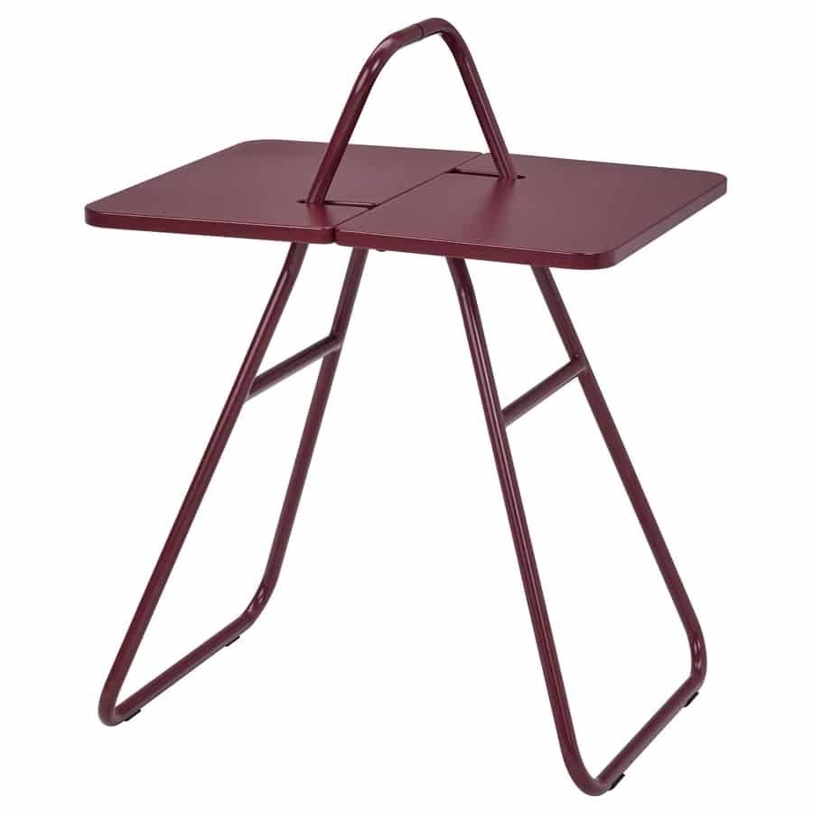 Maroon metal folding desk with a built-in carrying handle and two hinged surfaces