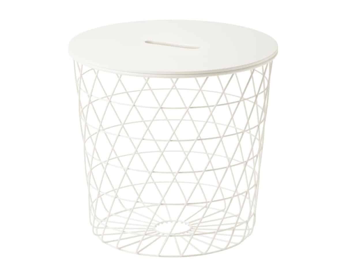 White round-lidded laundry hamper with a crisscross metal lattice design on the sides and base slot opening on top edge.