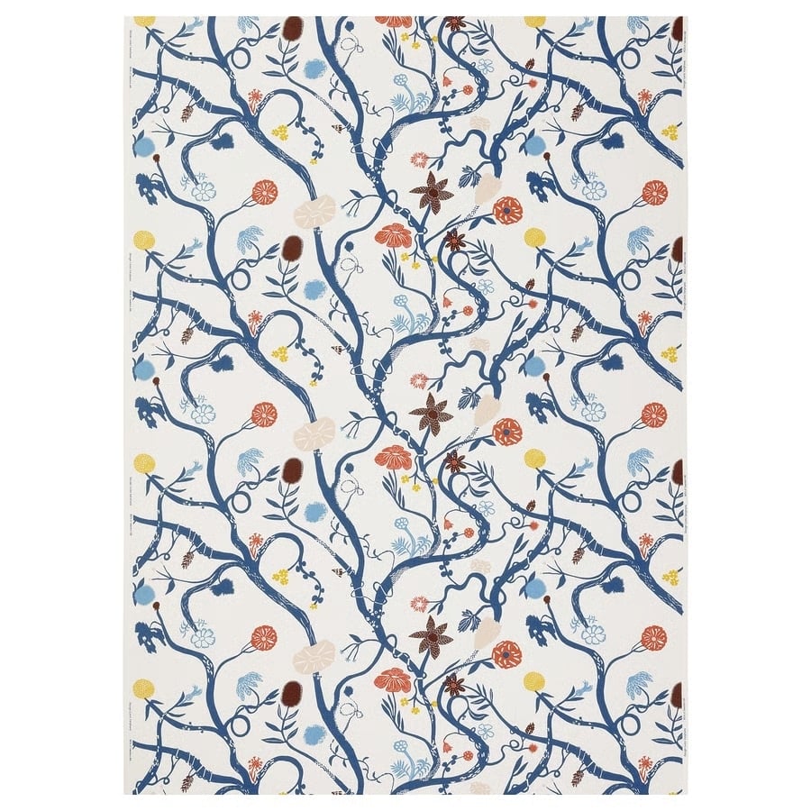 Decorative wallpaper with blue twisting vines and multicolored flowers on a light background.