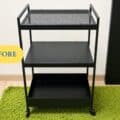 IKEA Nissafors cart on green carpet next to a mirror