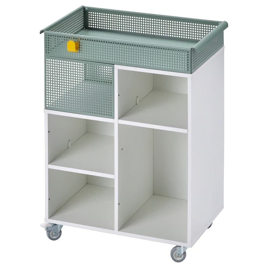 12 - IKEA Hackers ÖVNING Rolling Cart - Industrial rolling storage cart with a perforated metal top and white open-front cubby shelves on caster wheels