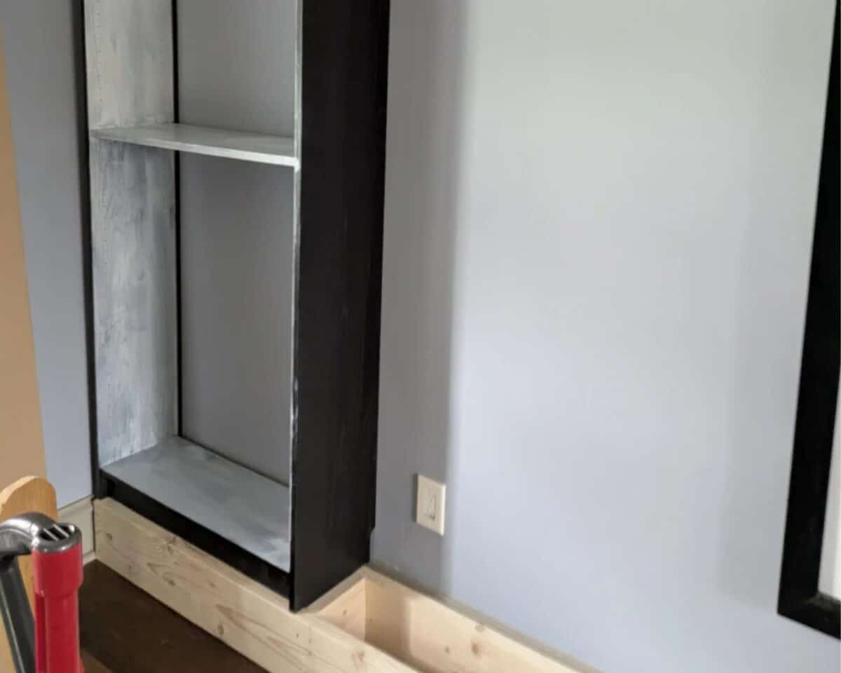 BILLY Bookcase on top of wooden frame without backer board