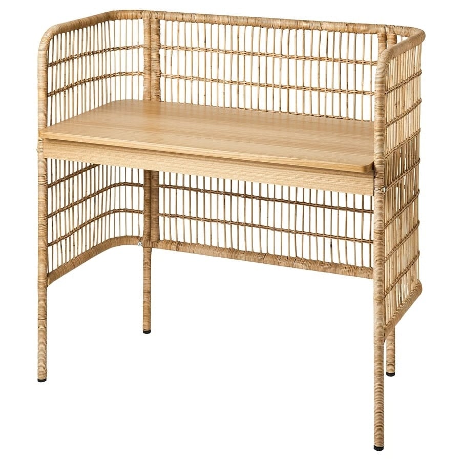 6 - IKEA Hackers FRYKSÅS Desk With Built-In Divider - Rattan desk with a wooden top and woven sides as a privacy screen.