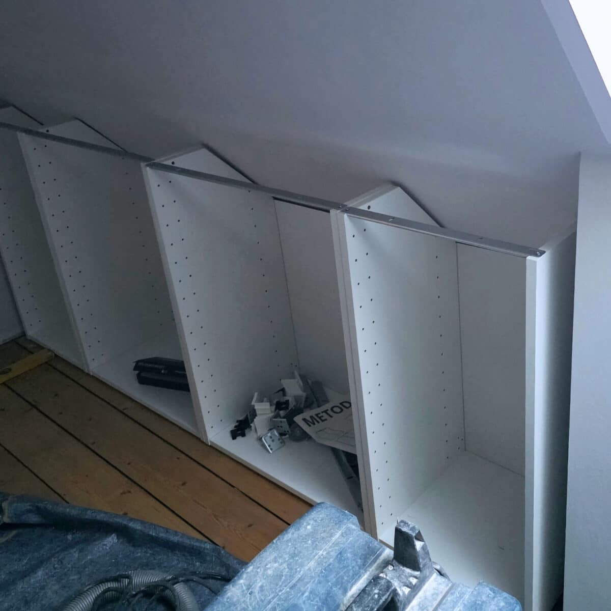 IKEA Kitchen cabinets cut to fit sloped ceilings